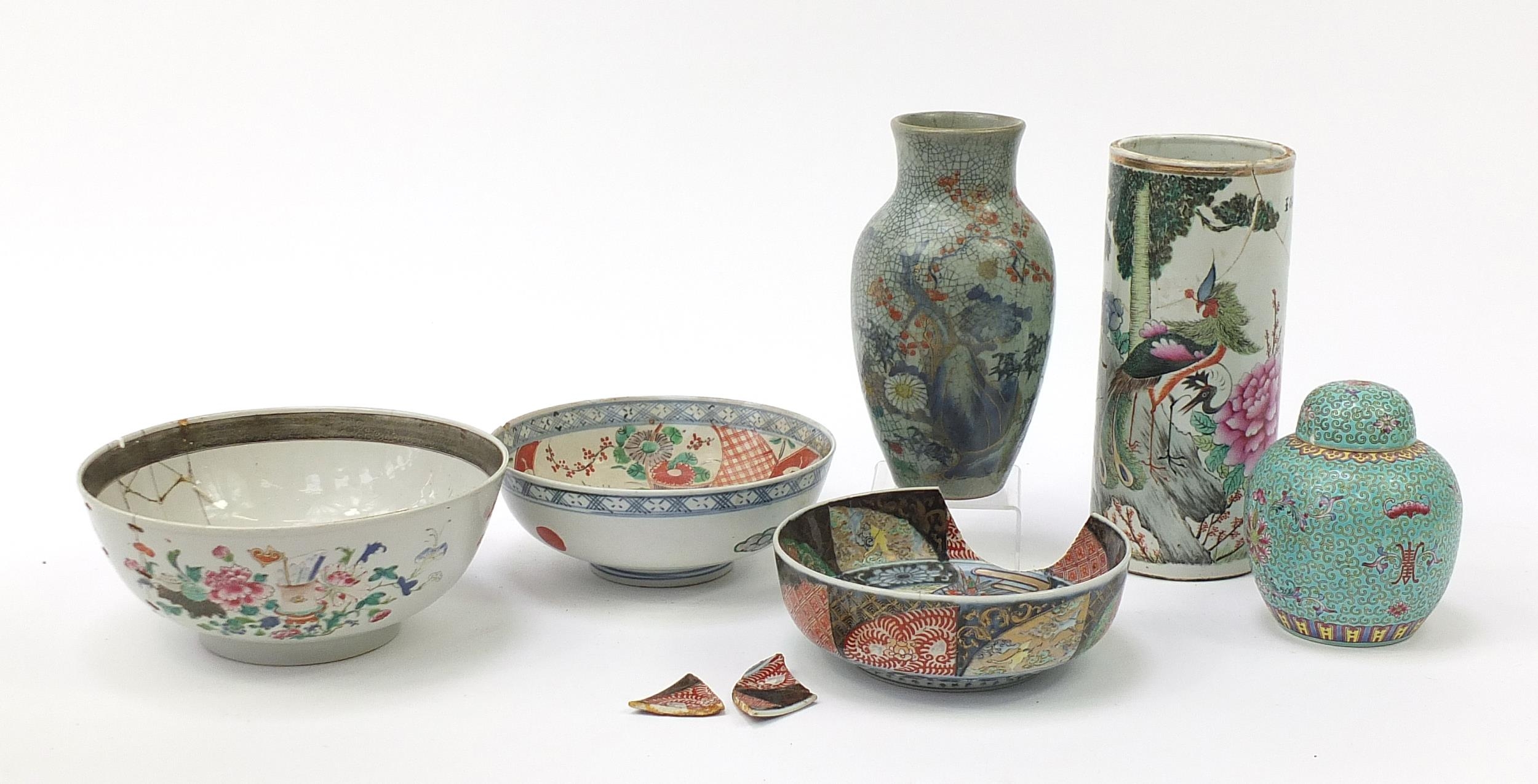 Chinese and Japanese porcelain including a cylindrical vase hand painted with a phoenix, Imari