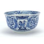 Chinese blue and white porcelain bowl, hand painted with figures holding vases and birds amongst