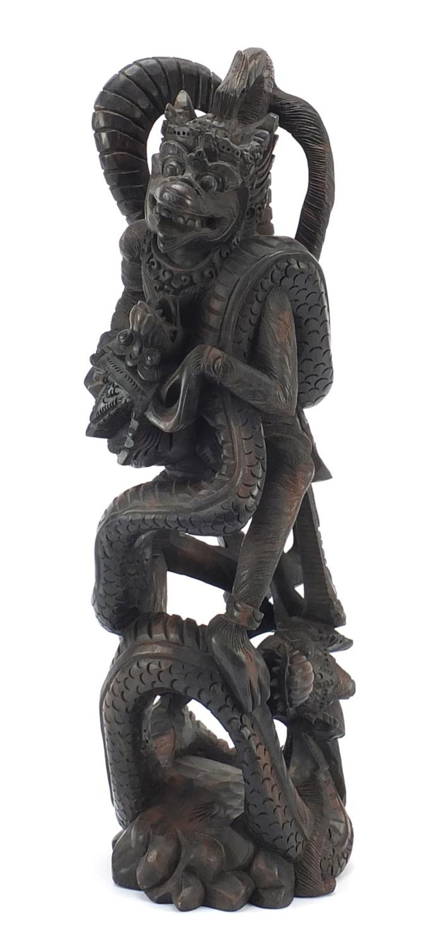 Large Balinese wooden carving of two dragons, 47cm high