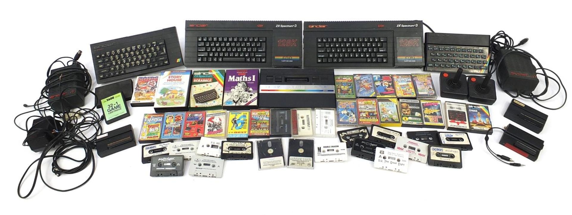 Selection of Sinclair and Atari vintage games including Spectrum, Atari 2600, Sinclair, joysticks