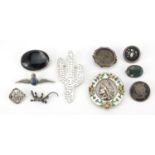 Ten antique and later silver brooches including enamelled Indian head, tortoiseshell pique work,