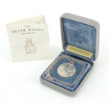 Silver Peter Rabbit pendant on chain with certificate and box, 2.7cm in diameter, 9.4g