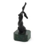 Mid century design patinated bronze sculpture of a seated rabbit raised on a green marbleised