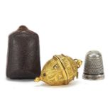 Charles Horner silver thimble with leather case and a gilt flip top octagonal thimble case