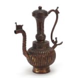 Tibetan patinated gilt bronze water pot, 24cm high