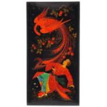 Russian lacquered wall plaque of a figure and a bird, 42cm high