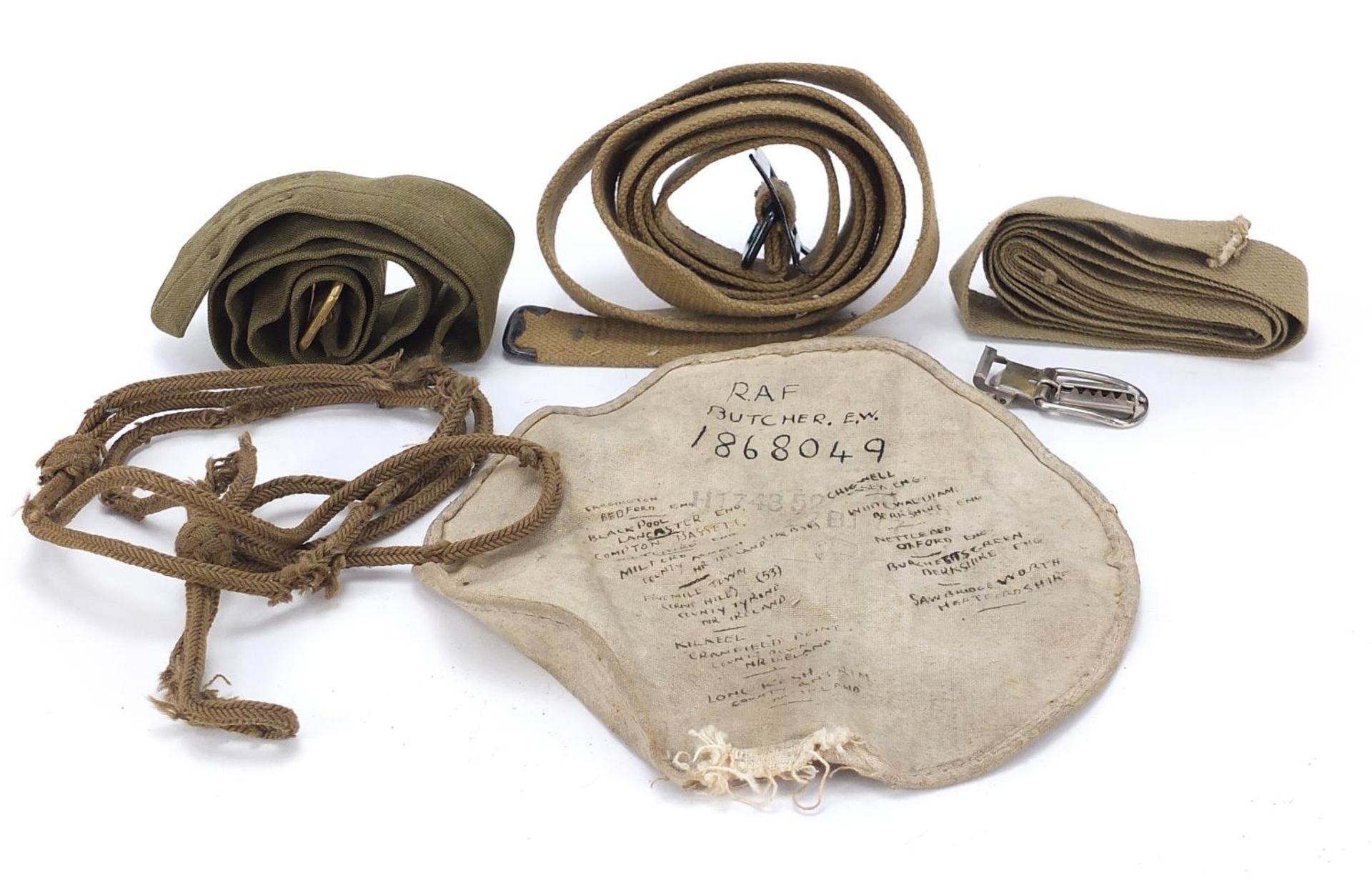 Militaria including canvas belts and material inscribed RAF Butcher EW 1868049