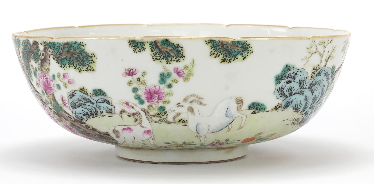 Chinese porcelain famille rose bowl with goats, red six figure character marks to the base, 22cm