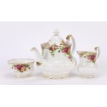 Royal Albert Old Country Rose pattern porcelain tea set comprising teapot, milk jug and sugar