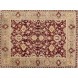 Large Indian hand knotted red ground rug, 365cm x 277cm