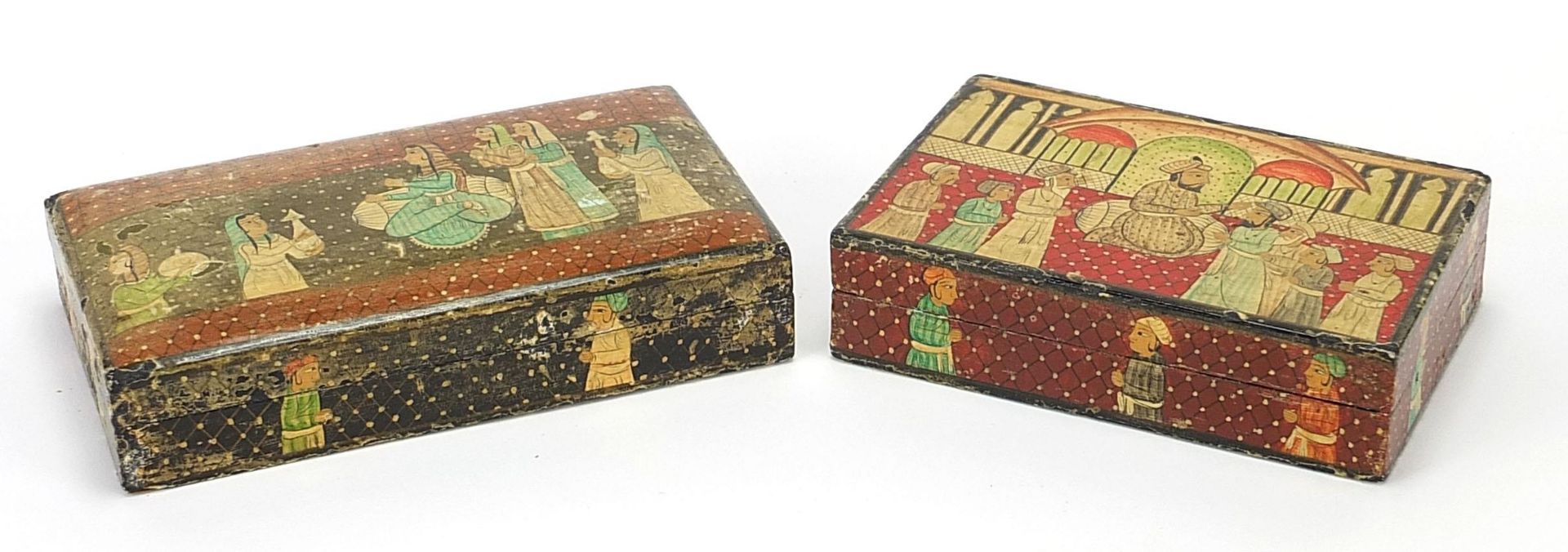 Two Indian Kashmir lacquered boxes and covers hand painted with figures praying, one with paper