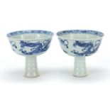 Pair of Chinese blue and white stem cup with dragons, 12cm in diameter