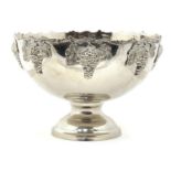 Large silver plated pedestal punch bowl with grape vines, 38cm in diameter