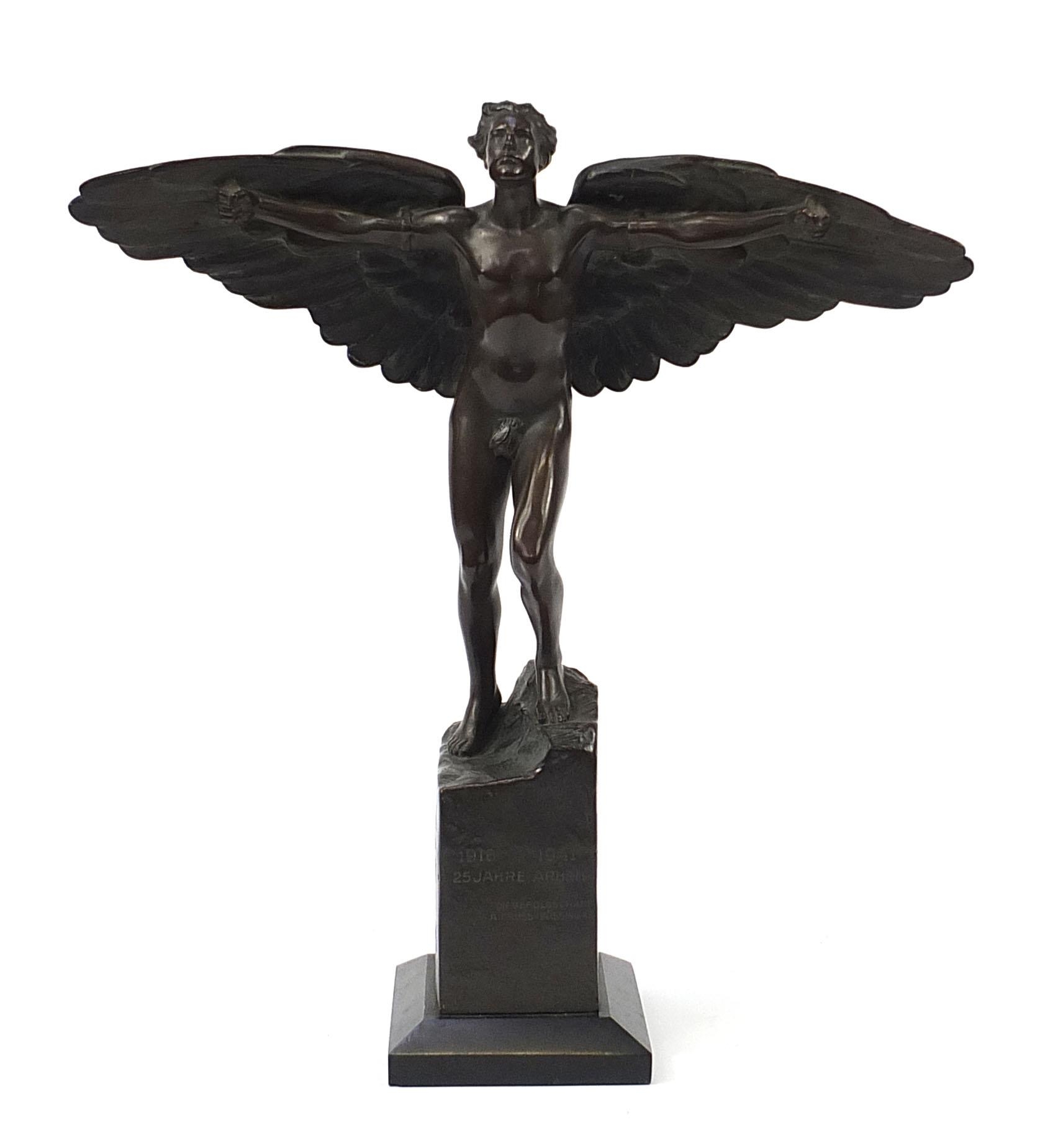 Victor Heinrich Seifert, large patinated bronze figure of a winged nude man, Icarus, raised on a