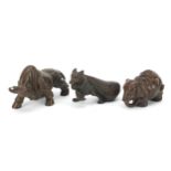 Three Japanese patinated bronze animals comprising bull, rat with a sack and elephant, each with