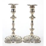 William Hutton, pair of Edwardian silver candlesticks, London 1909, 23cm high, each 646g