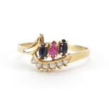 14ct gold ring set with white sapphires, blue sapphires and a ruby, size P, 1.8g