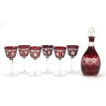 Set of six Bohemian ruby flashed cut glasses and a decanter, the largest 29.5cm high