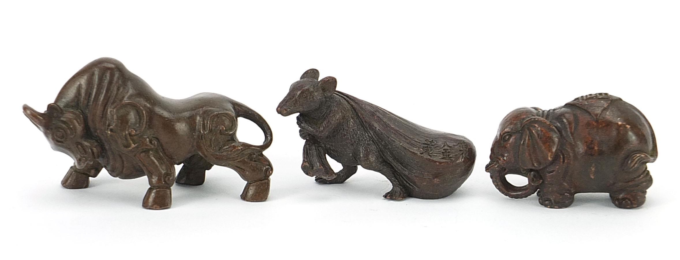 Three Japanese patinated bronze animals comprising bull, rat with a sack and elephant, each with - Image 2 of 10