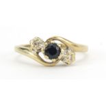 9ct gold sapphire and diamond crossover ring, size K, 2.0g