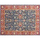 Large Indian hand woven blue ground rug, 360cm x 280cm
