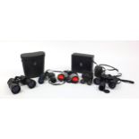 Four pairs of binoculars and a pair of opera glasses including Tobishika and Tecnar