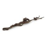 Large Japanese patinated bronze dragon, impressed marks, 22cm in length