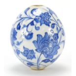 Turkish Iznik pottery hanging mosque ball hand painted with flowers, 13.5cm high