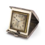 Art Deco silver cased folding travel watch with engine turned decoration, the case by Adie