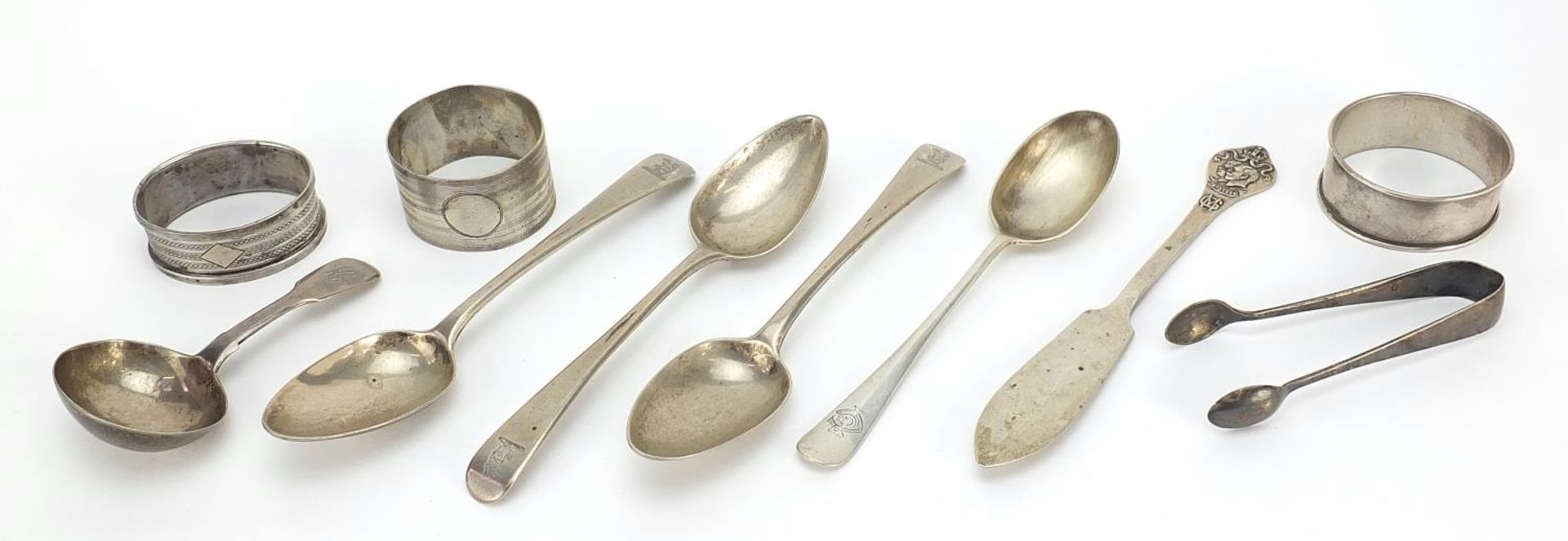 Georgian and later silver including caddy spoon, napkin rings and teaspoons, various hallmarks,