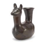 Continental pottery llama jug inscribed Kutifo Cofoyate to the base, 26.5cm high