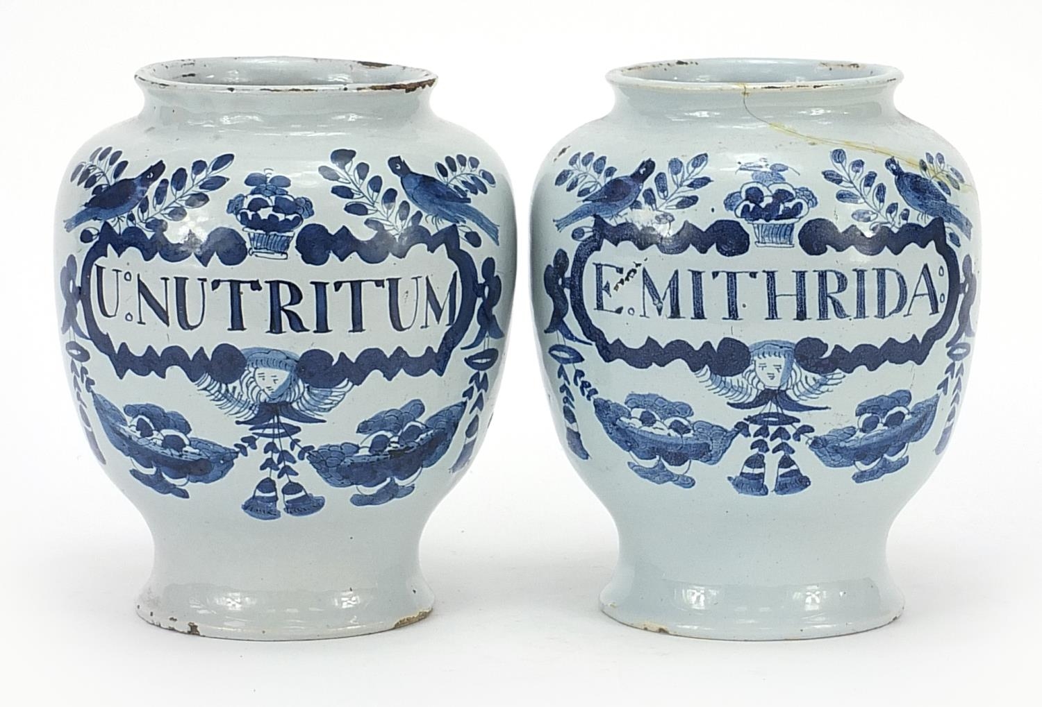 Two 18th century Delft blue and white tin glazed drug jars, 19cm high