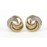 Pair of 9ct gold diamond stud earrings, 9.2mm in diameter