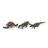 Three Japanese patinated bronze animals comprising sea turtle, crocodile and one other, two with