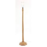 Robert Mouseman Thompson, adzed oak standard lamp with carved mouse, 145.5cm high