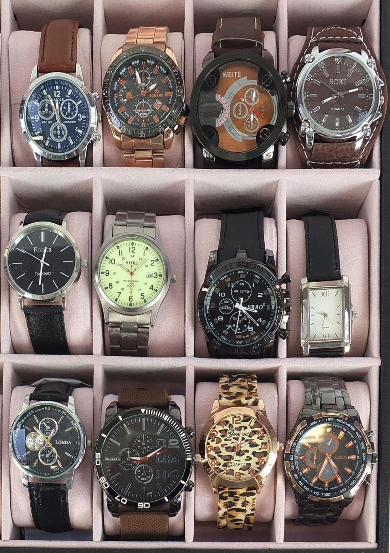Twenty four Gentlemen's dress wristwatches including Rovite, Yazole and Soki, housed in a display - Image 3 of 8