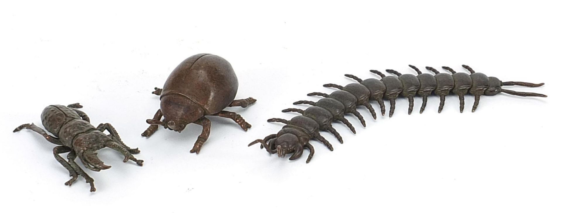 Three Japanese patinated bronze insects comprising centipede with articulated body and two