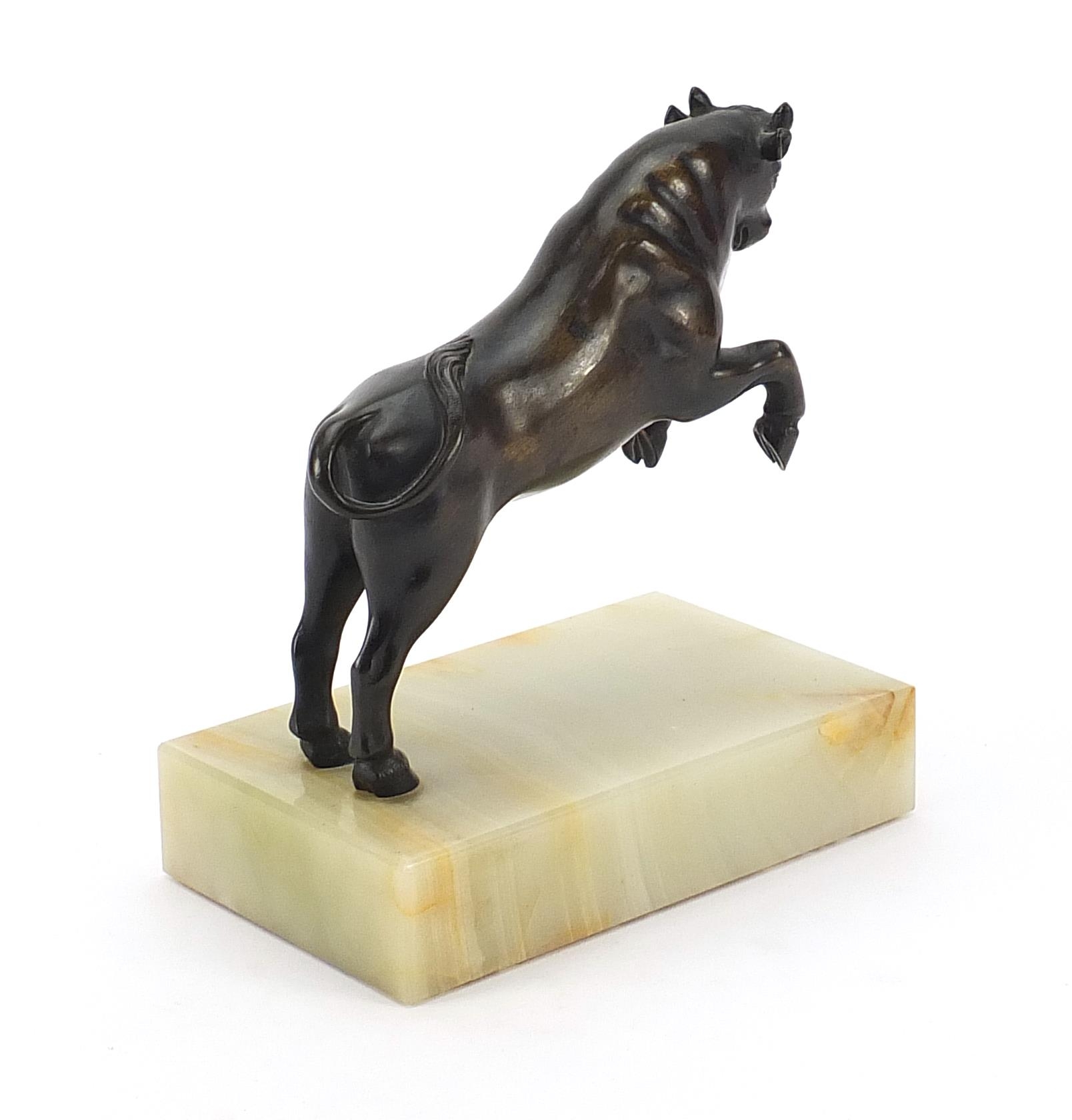 Patinated bronze study of a rearing bull raised on rectangular onyx base, 19cm high - Image 2 of 3