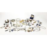 Antique and later costume jewellery including broken 9ct gold identity bracelet, silver bracelet