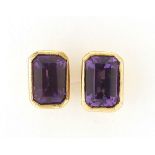 Pair of 9ct gold amethyst stud earrings, 7mm x 5mm, 1.6g