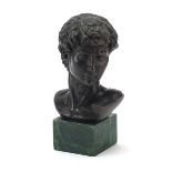 Patinated bronze bust of David raised on a green marbleised base, 17cm high
