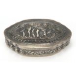 Indian unmarked silver snuff box, the hinged lid embossed with a mythical animal, 6.5cm wide, 29.2g