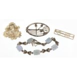 Silver jewellery comprising two Art Nouveau style brooches, floral brooch and a cabochon blue