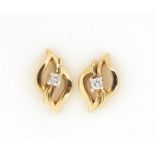 Pair of 9ct gold diamond stud earrings, 1.1cm high, 1.3g