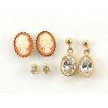 Three pairs of 9ct gold earrings including cameos, the largest 1.3cm high, total 2.4g
