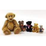Five articulated teddy bears to include Deans Rag Book, Merrythought and Herman, the largest 44cm
