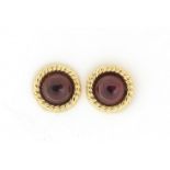 Pair of 9ct gold cabochon garnet stud earrings, 8mm in diameter, 0.6g