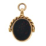 Victorian 15ct gold hardstone spinner fob, hallmarked Birmingham 1887, 3cm high, 7.0g