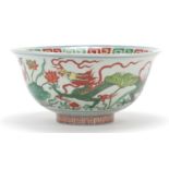 Chinese porcelain dragon bowl housed in a fitted box, character marks to the base, 21cm in diameter