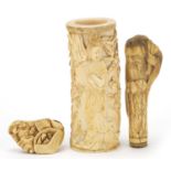 Chinese ivory and bone carvings including a tusk section carved with a figure amongst flowers and